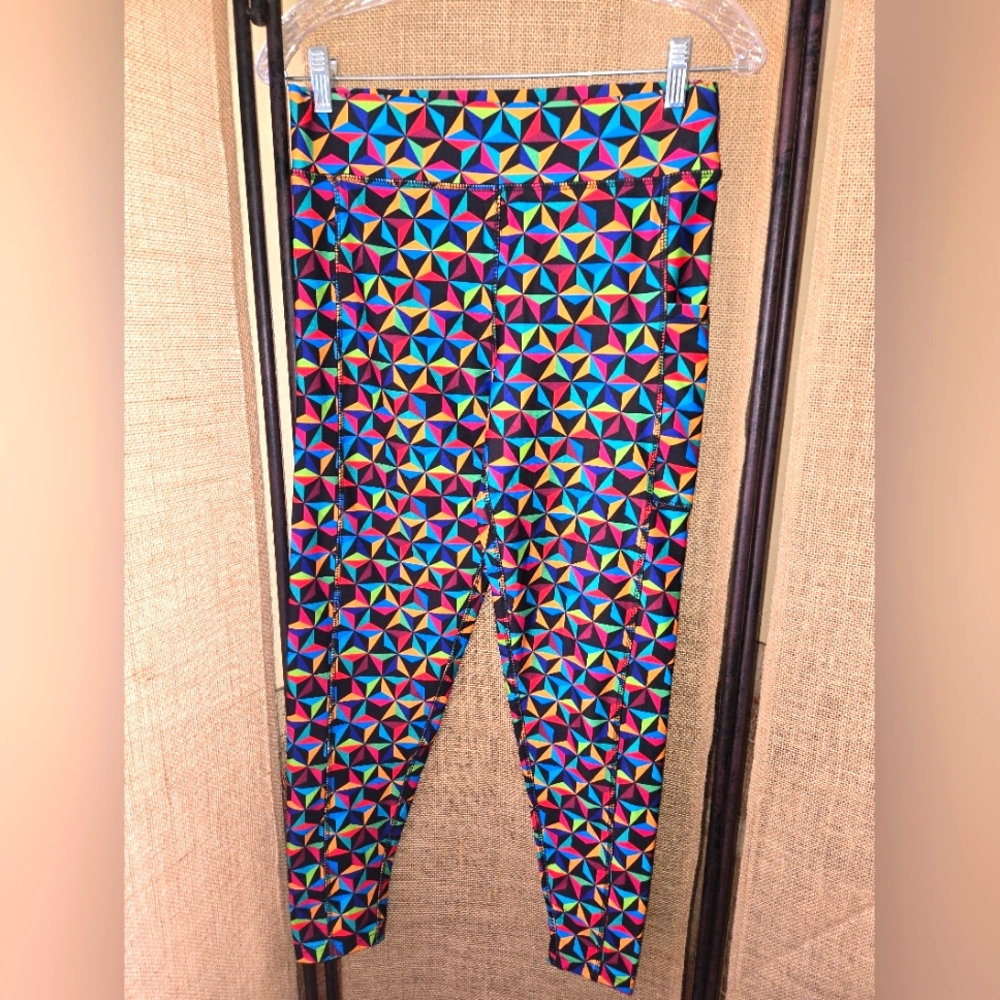 NWOT Women's Disney Epcot Muticolor Geometric Print Leggings Size Medium